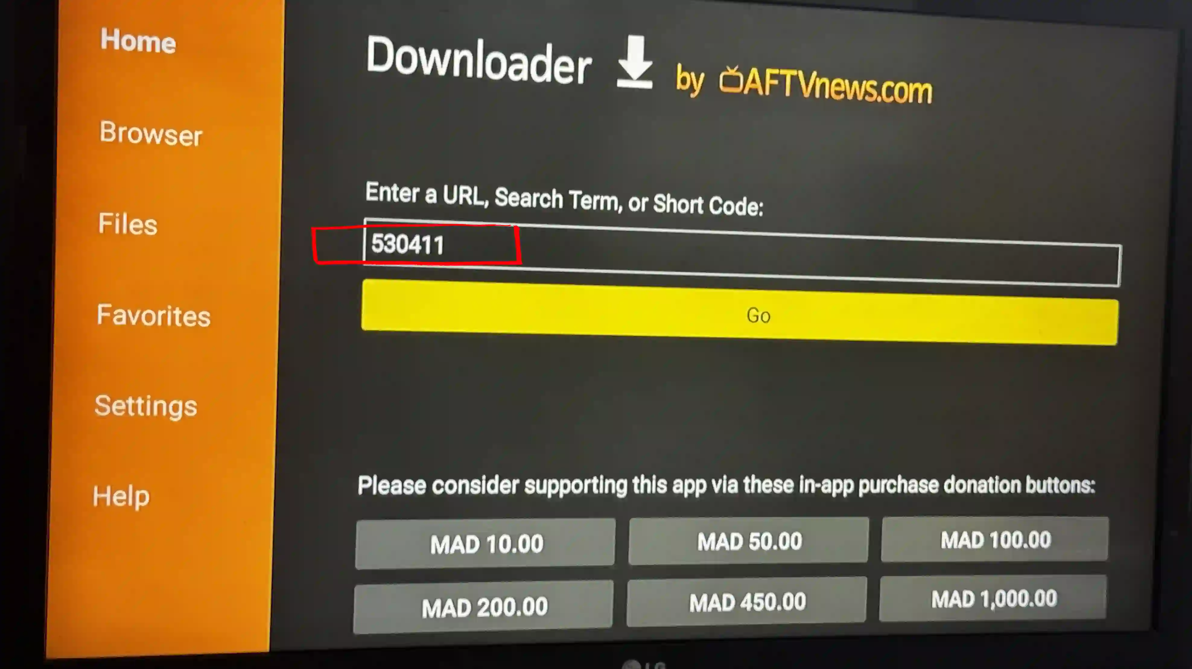 Enter code 530411 in Downloader app on Android TV Box to download IPTV Smarters Pro APK